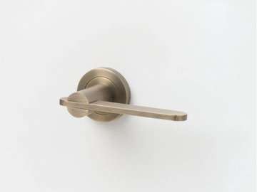 INTERSECT - Brass door handle on rose by Lo & Co Interiors - view 2